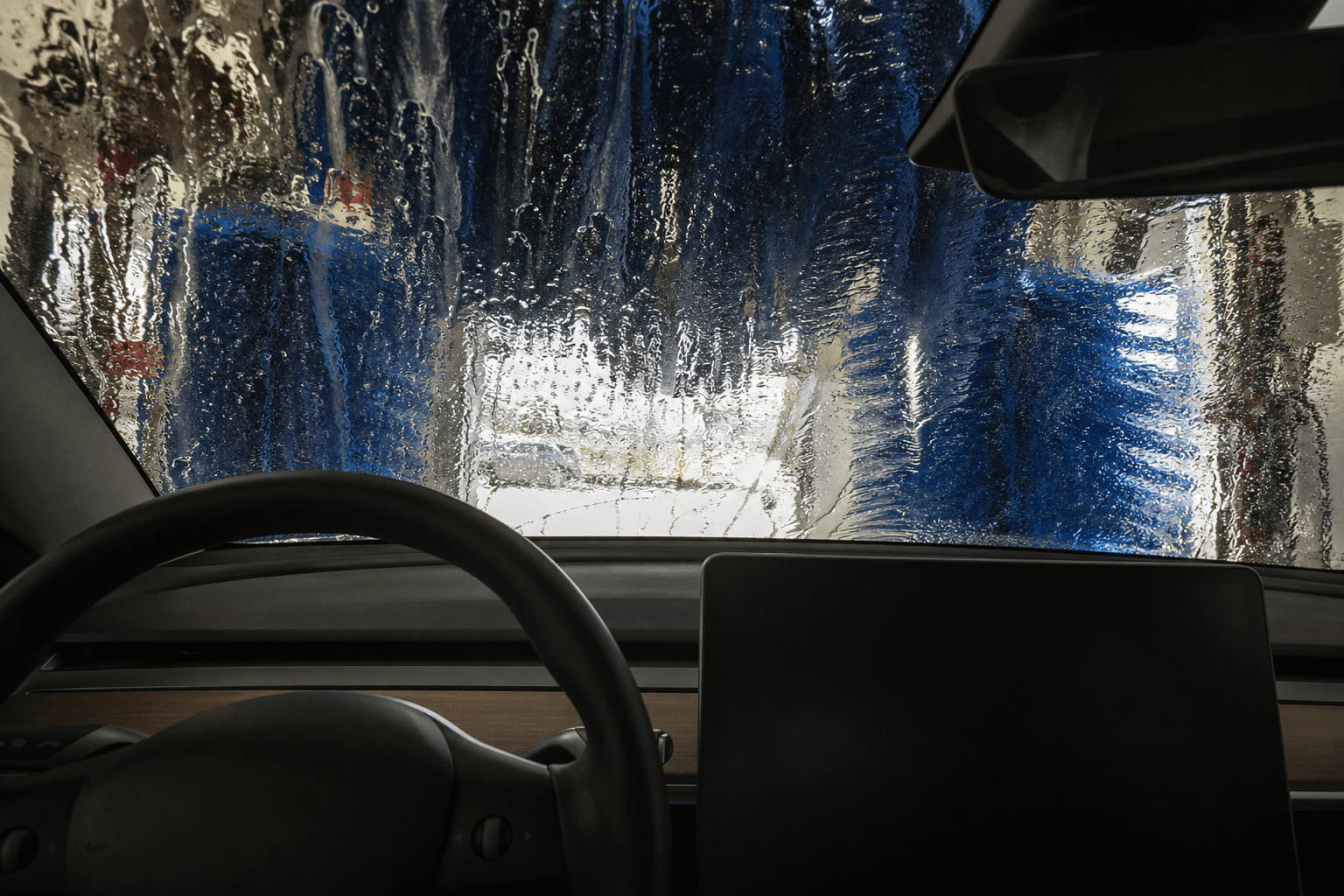 Can I take my electric car through a car wash?