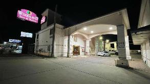 Woodland Inn and Suites - 4814 Avenue H Garage