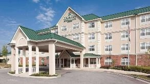 Photo of Country Inn & Suites - 8825 Yellow Brick Rd Garage spot, located 3.5 mi from Near Shekinah Glory African Restaurant in