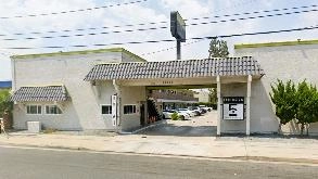 Find Parking Spot in Exclusivo Inn & Suites LGB Airport  Parking Garage