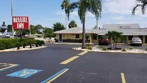 Find Parking Spot in Deluxe Inn SRQ Airport Parking Garage