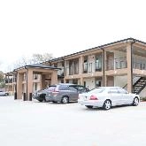 Find Parking Spot in Paradise Inn & Suites BTR Airport Parking Garage