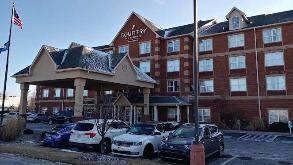 Find Parking Spot in Country Inn & Suites by Radisson CVG Airport  Parking Garage