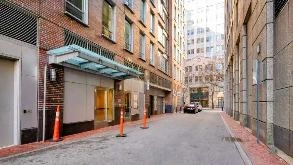 Photo of 21 Well St. (80 Broad St.)_Folio Boston  Valet Garage spot, located 0.5 mi from Near Flight Club Boston in Boston