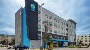 Find Parking Spot in Tru by Hilton AUS Airport Parking Garage